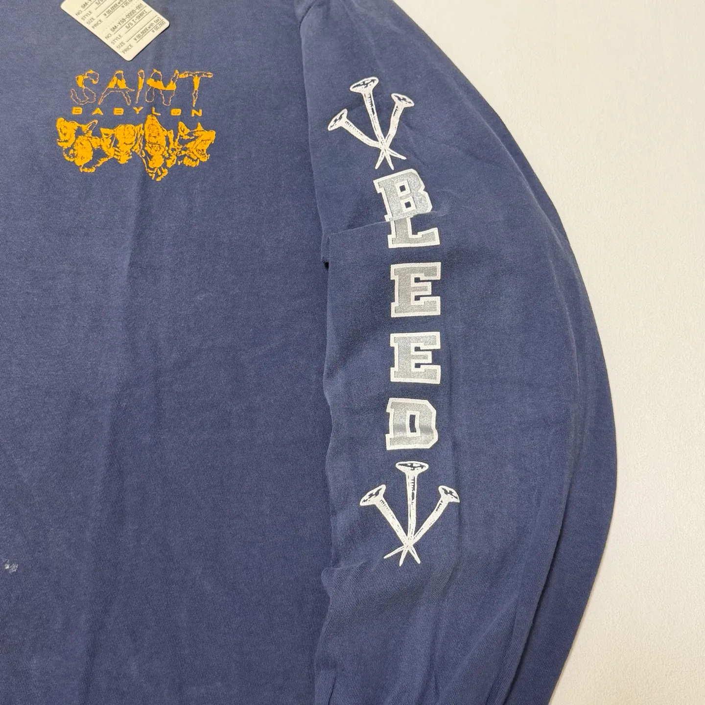 SAINT Mxxxxxx × BABYLON BBLN_LS TEE/SAINT BABYLON/NVY/BABYLON co-branded style Wolf head SAINT/nail distressed long sleeves Washed blue S-XL Completely matched Tube weaving fabric without side seams Garment dyeing Maliu water faded distressing Simulated sun fading treatment Natural fading Handmade holes and frayed Ink splashing treatment Correct main mark/wash mark/little angel anti-counterfeiting mark